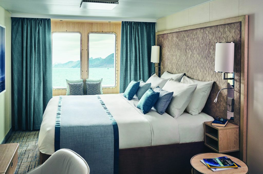 Queen bed and 2 large windows.