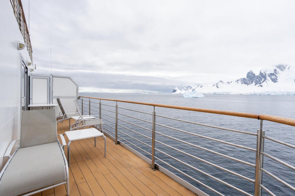 Long balcony with chairs.  