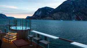 View of the jacuzzi on the outside deck of the Greg Mortimer 