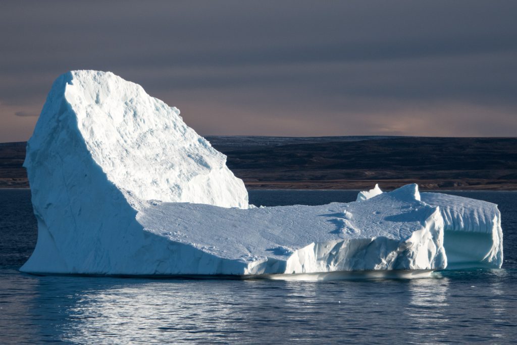 An iceberg at twilight.