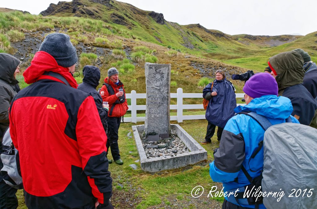 Guests standing around Shackleton's gravesite. 