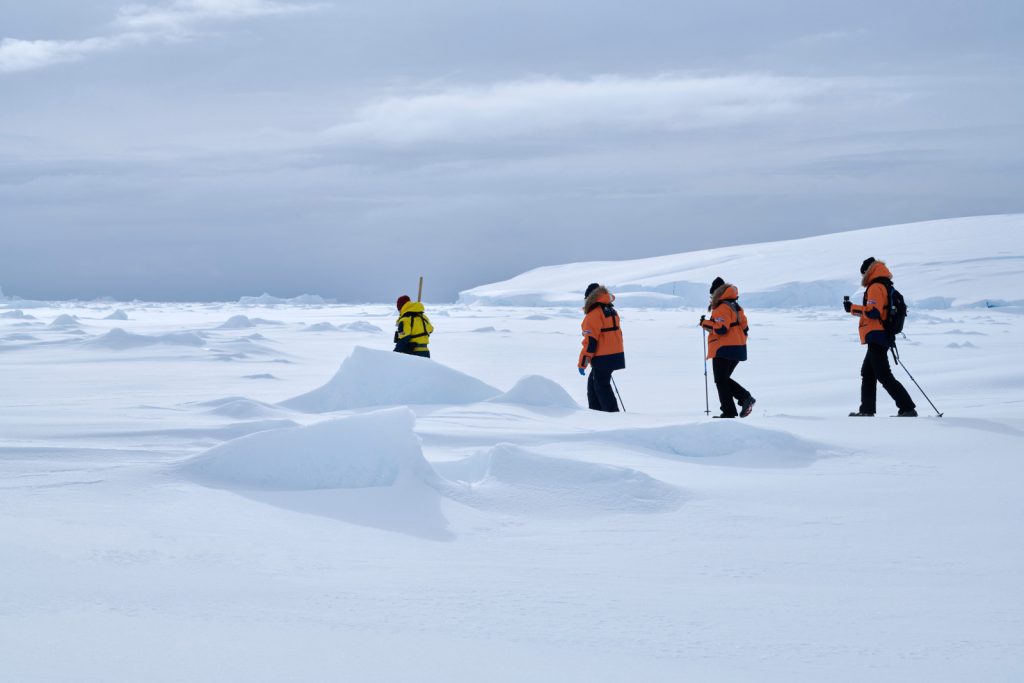 Guests walking on the sea ice. 