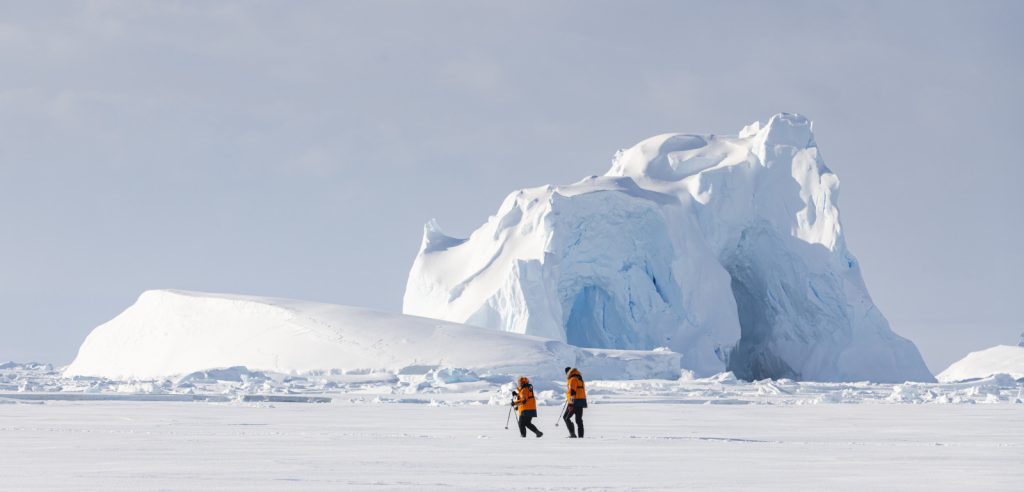 Guests hiking on the sea ice.