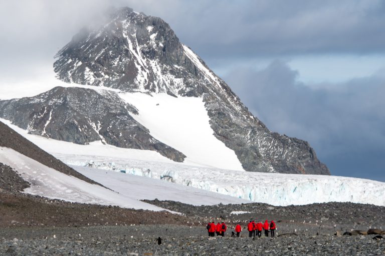 Passengers on shore in the South Shetland Islands, Antarctica