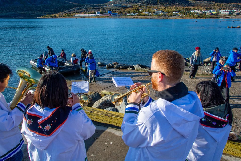 Local residents performing music for guests.