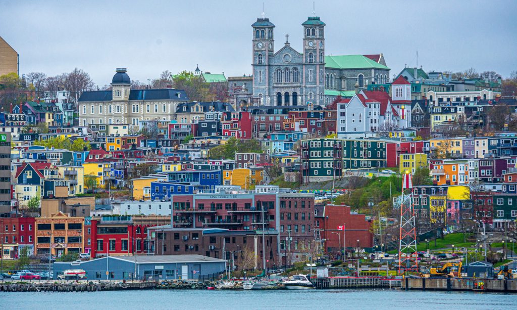 Old St. John's colorful buildings from the water.