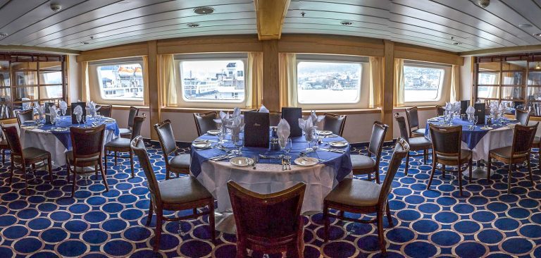 Dining Room on the Expedition with circular chair and large windows