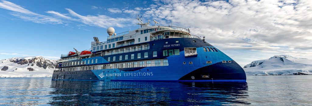 Side exterior view of Ocean Victory in Antarctica