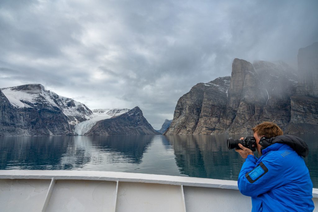 Guest photographic Arctic landscape from ship. 