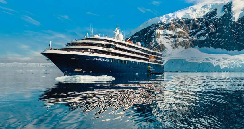 World Voyager expedition ship with glacier in background