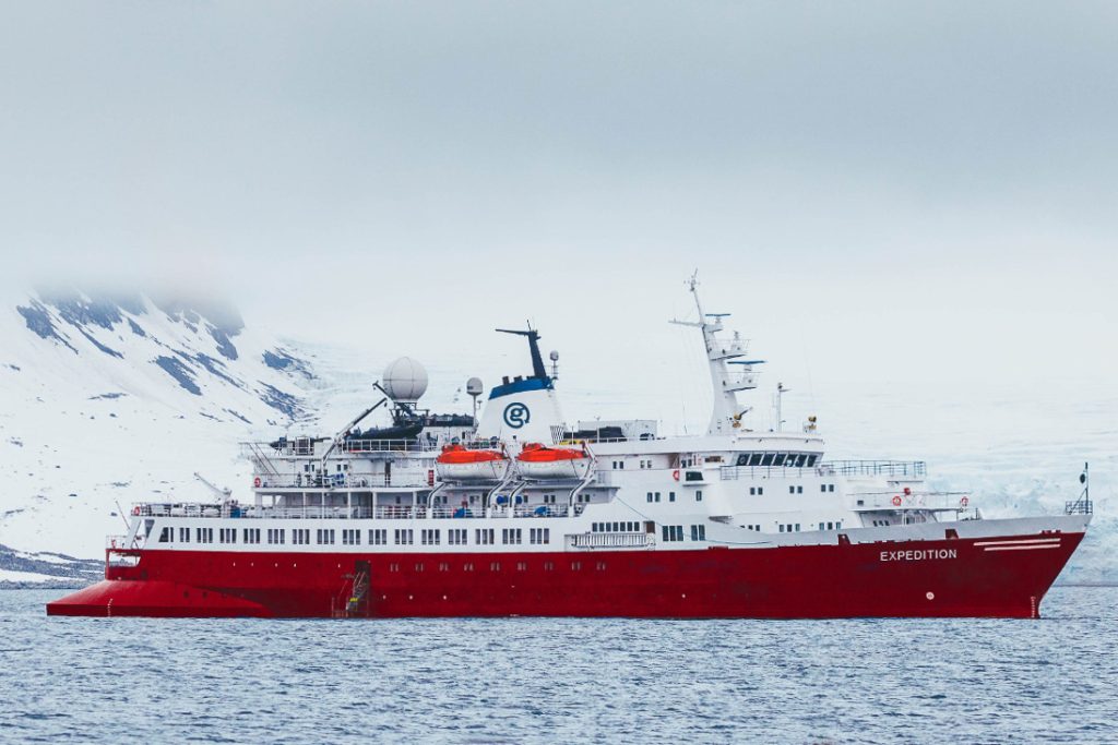 Exterior view of the ship Expedition with red hull.