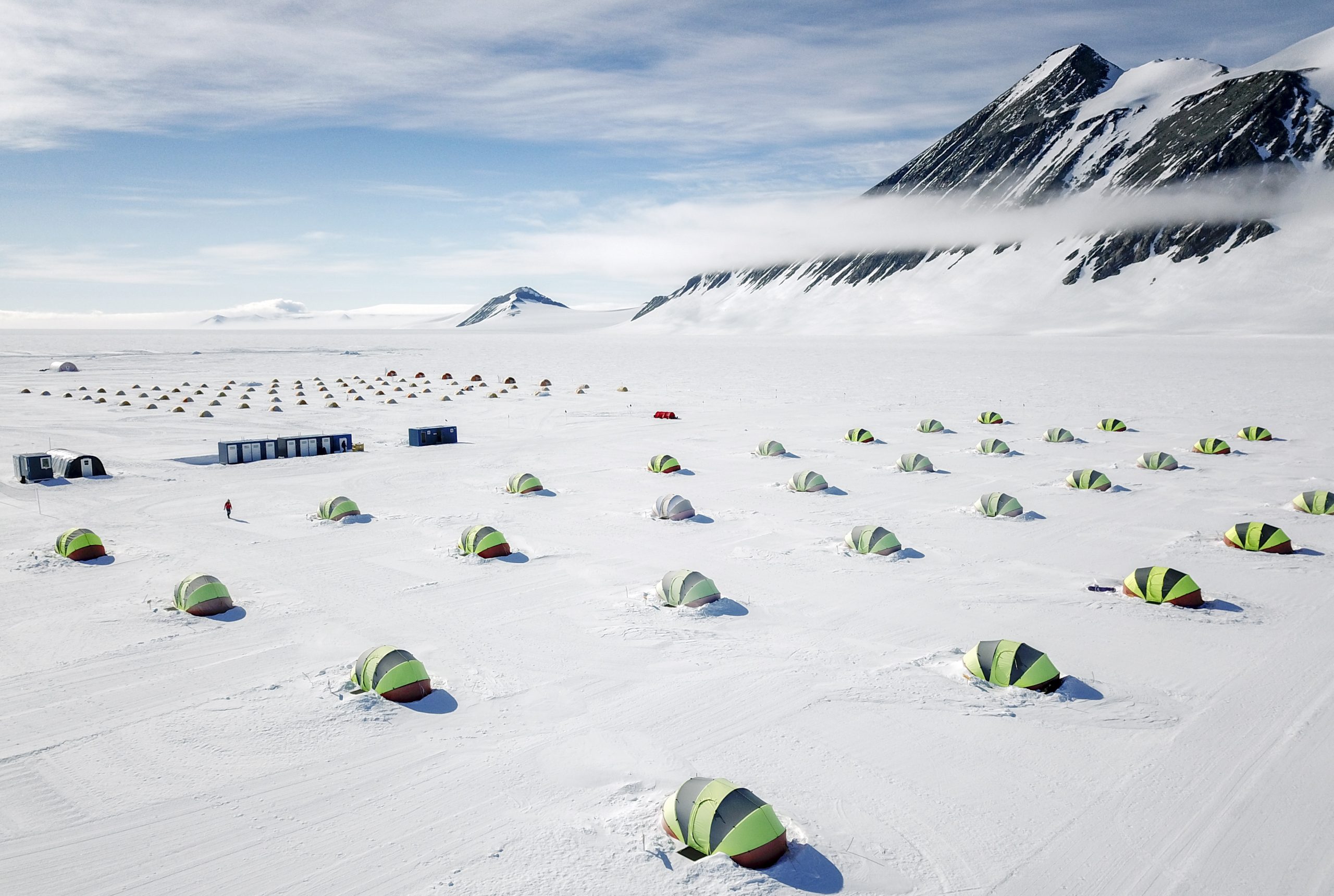 Overhead view of Union Glacier camp with rows of tents.