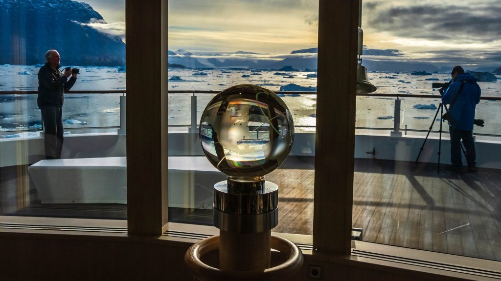 Guests photograph from the Observation deck on the ship National Geographic Endruance, Northeast Greenland. 