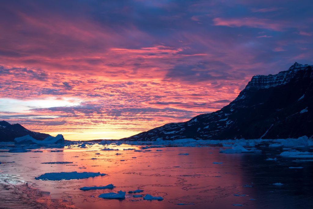 A beautiful sunrise in Scoresbysund, East Greenland.