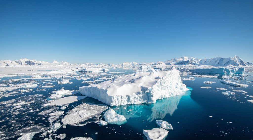 Iceberg with surrounding brash ice in Antarctica. 