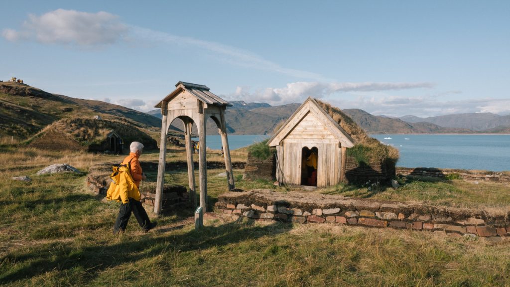 Guest visiting Viking ruins in South Greenland. 